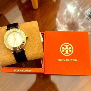 Never worn brand new Tory Burch watch in original box. Will need new battery.